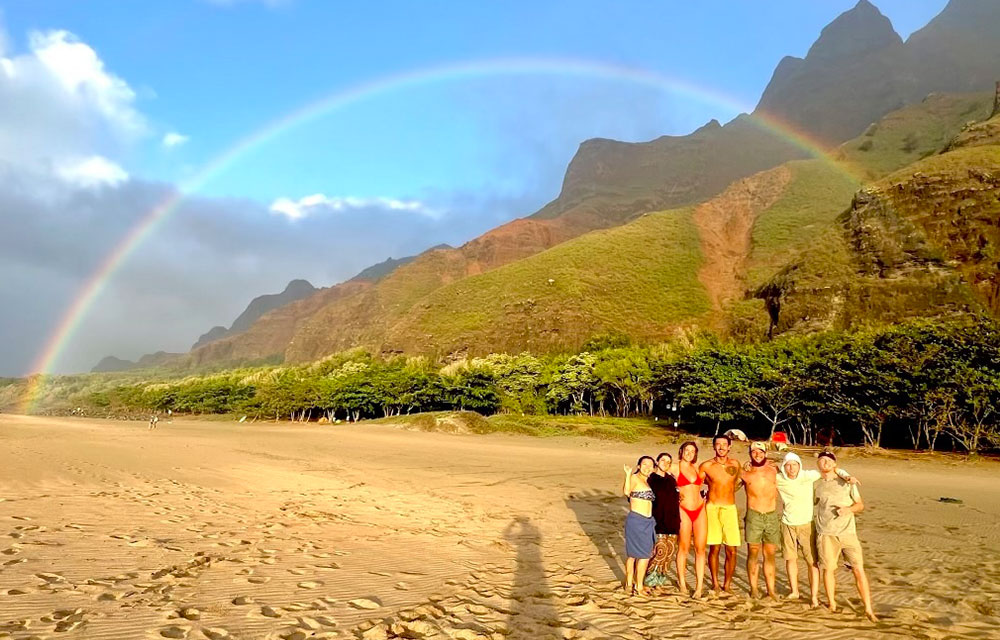 Kauai Style Vacations beach group rainbow photo